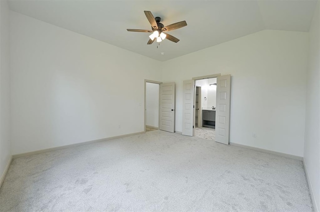 128 E 7th St, Arcadia, OK 73007 - unfurnished bedroom with light colored carpet, baseboards, ensuite bath, and ceiling fan