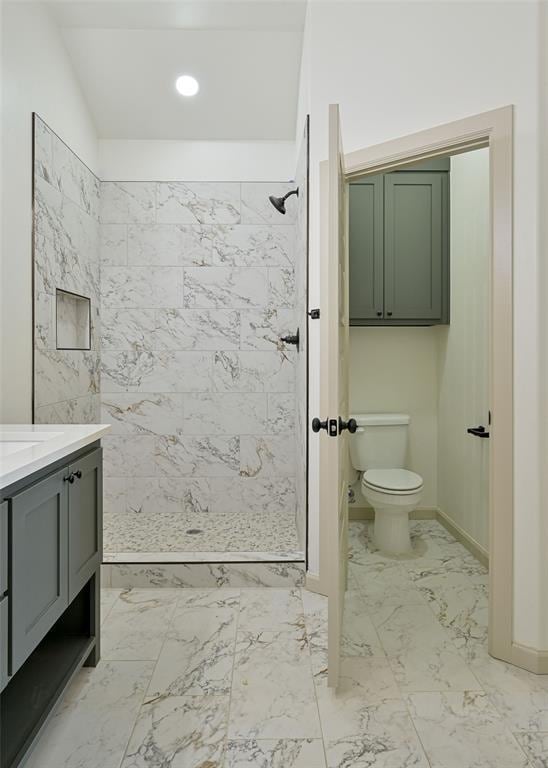 128 E 7th St, Arcadia, OK 73007 - full bathroom with marble finish floors, toilet, a shower stall, and vanity
