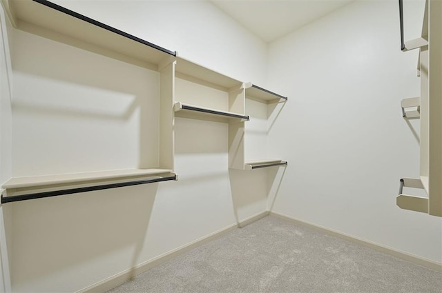 128 E 7th St, Arcadia, OK 73007 - spacious closet featuring light colored carpet