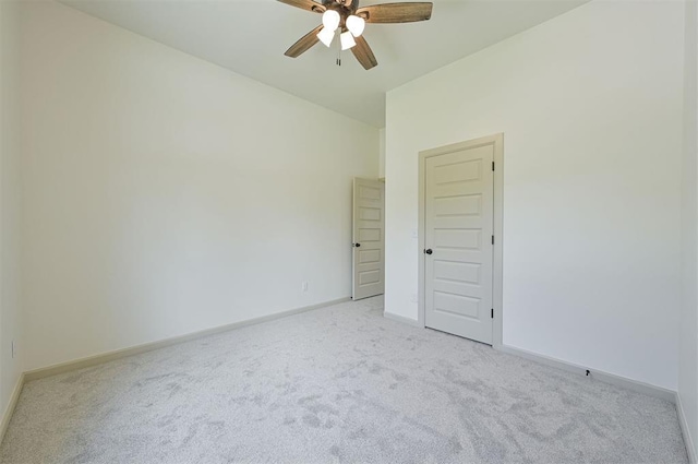 128 E 7th St, Arcadia, OK 73007 - spare room with light colored carpet, baseboards, and ceiling fan