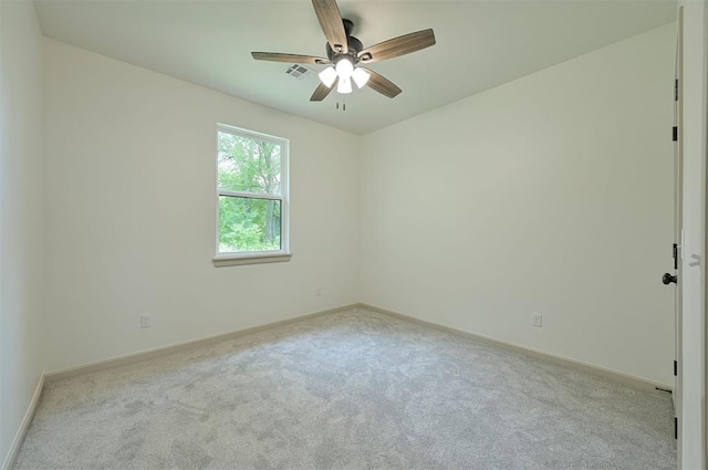 128 E 7th St, Arcadia, OK 73007 - empty room featuring carpet floors, ceiling fan, and baseboards