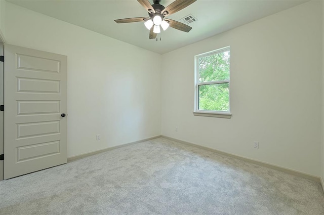 128 E 7th St, Arcadia, OK 73007 - unfurnished room featuring carpet, baseboards, and a ceiling fan