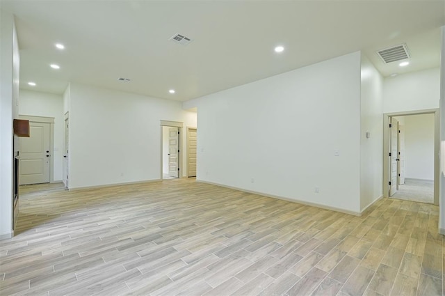 128 E 7th St, Arcadia, OK 73007 - spare room featuring light wood-type flooring, recessed lighting, and baseboards