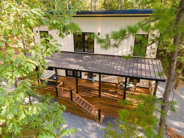 167 Penner Rd, Broken Bow, OK 74728 - exterior space featuring stairs, metal roof, and a deck