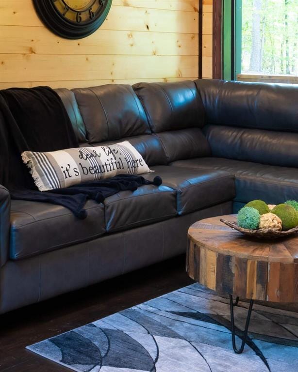 167 Penner Rd, Broken Bow, OK 74728 - living area with wood finished floors and wooden walls