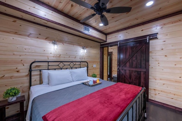 167 Penner Rd, Broken Bow, OK 74728 - bedroom featuring a barn door, wooden walls, recessed lighting, and wooden ceiling