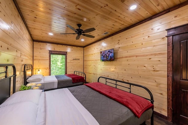 167 Penner Rd, Broken Bow, OK 74728 - bedroom with visible vents, recessed lighting, wood ceiling, and wood walls