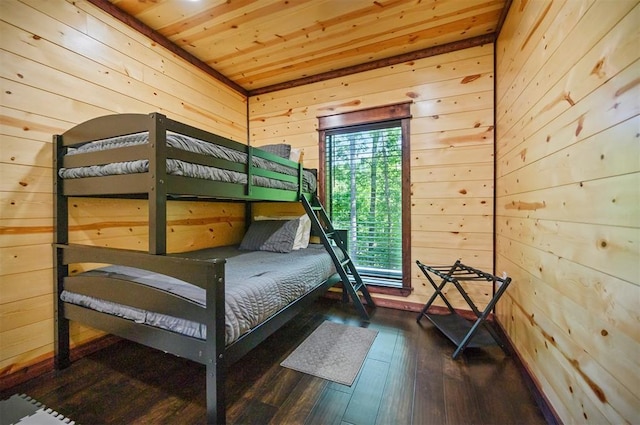 167 Penner Rd, Broken Bow, OK 74728 - bedroom featuring wooden walls, wood ceiling, and wood-type flooring