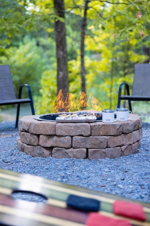 167 Penner Rd, Broken Bow, OK 74728 - exterior details featuring a fire pit
