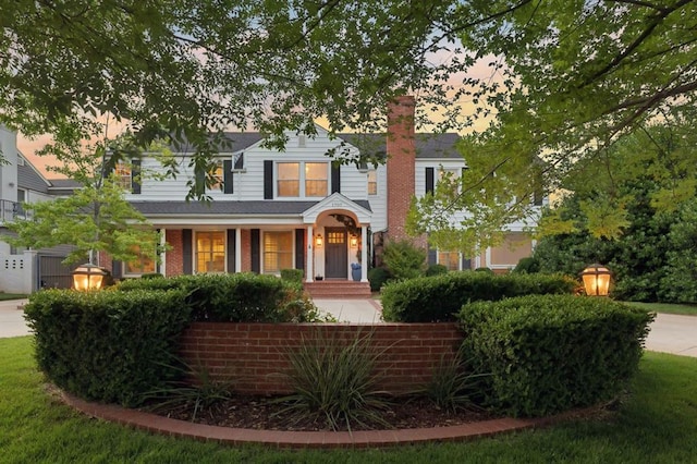1707 Pennington Way, Nichols Hills, OK 73116 - view of front of house featuring a chimney
