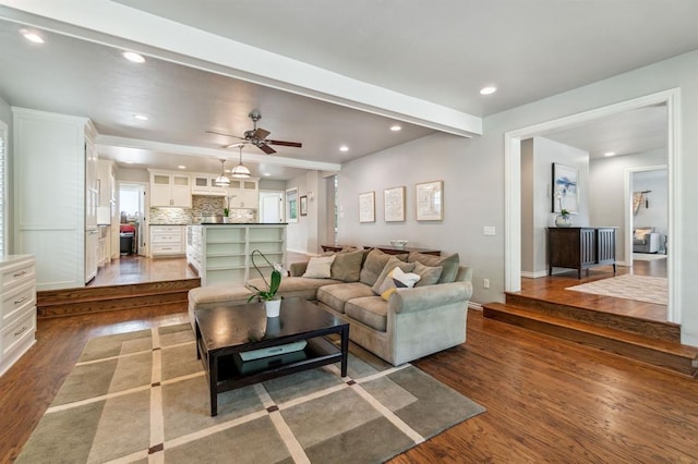 1707 Pennington Way, Nichols Hills, OK 73116 - living area with dark wood finished floors, recessed lighting, ceiling fan, and baseboards