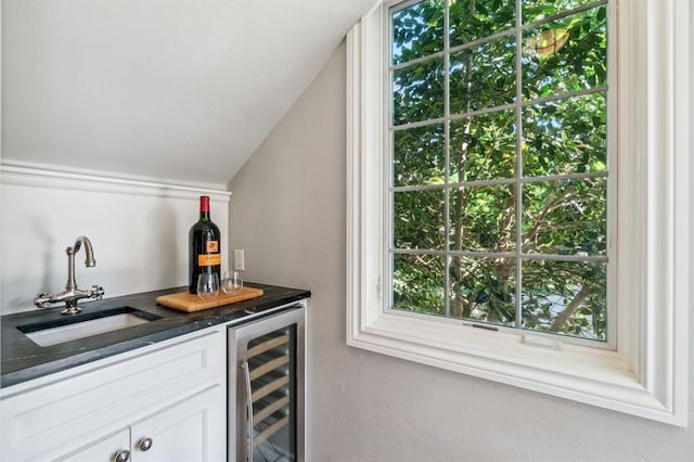 1707 Pennington Way, Nichols Hills, OK 73116 - indoor dry bar with wine cooler and vaulted ceiling