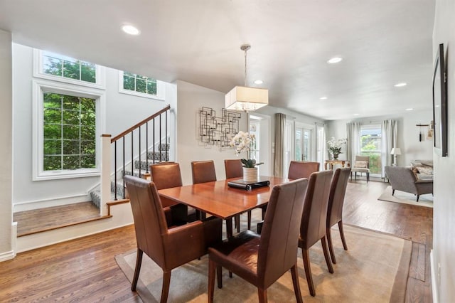 1707 Pennington Way, Nichols Hills, OK 73116 - dining area with light wood-style flooring, stairway, recessed lighting, baseboards, and a chandelier