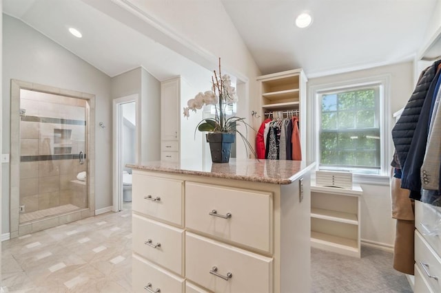 1707 Pennington Way, Nichols Hills, OK 73116 - walk in closet featuring lofted ceiling
