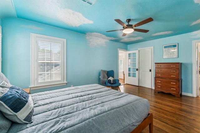 1707 Pennington Way, Nichols Hills, OK 73116 - bedroom featuring wood finished floors and a ceiling fan