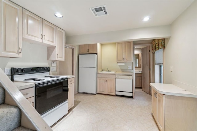 1707 Pennington Way, Nichols Hills, OK 73116 - kitchen with white appliances, a sink, light brown cabinets, light countertops, and recessed lighting