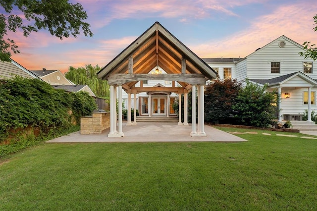 1707 Pennington Way, Nichols Hills, OK 73116 - rear view of property with a lawn, a gazebo, french doors, and a patio area