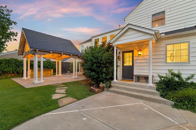 1707 Pennington Way, Nichols Hills, OK 73116 - property entrance with a lawn