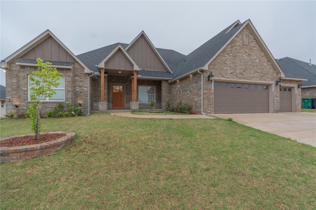craftsman-style house with concrete driveway, brick siding, board and batten siding, a front lawn, and a garage