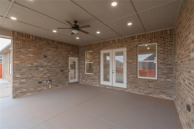 view of patio with french doors and a ceiling fan