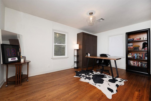 2837 Cambridge Ct, Oklahoma City, OK 73116 - office space with baseboards, visible vents, and wood finished floors