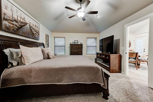 5513 Carmel Creek Dr, Mustang, OK 73064 - bedroom with carpet, vaulted ceiling, multiple windows, and a ceiling fan