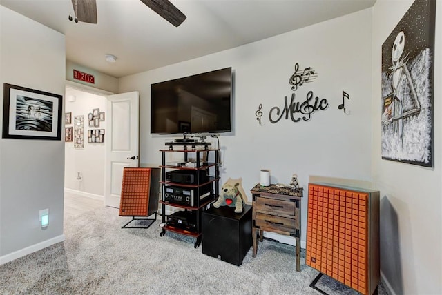 5513 Carmel Creek Dr, Mustang, OK 73064 - living area featuring carpet flooring, baseboards, and a ceiling fan
