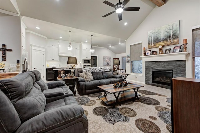 5513 Carmel Creek Dr, Mustang, OK 73064 - living area with recessed lighting, ceiling fan, wood finished floors, a fireplace, and high vaulted ceiling