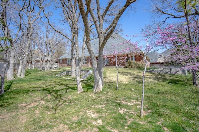 view of yard featuring fence