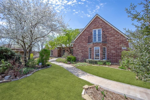 2500 Portofino Pl, Edmond, OK 73034 - view of front of house featuring brick siding and a front yard