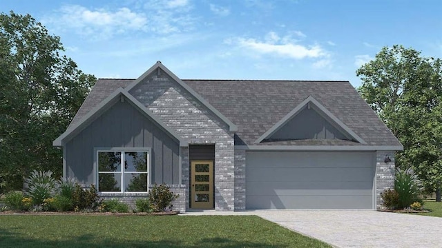 view of front of property with a front lawn, driveway, an attached garage, and board and batten siding