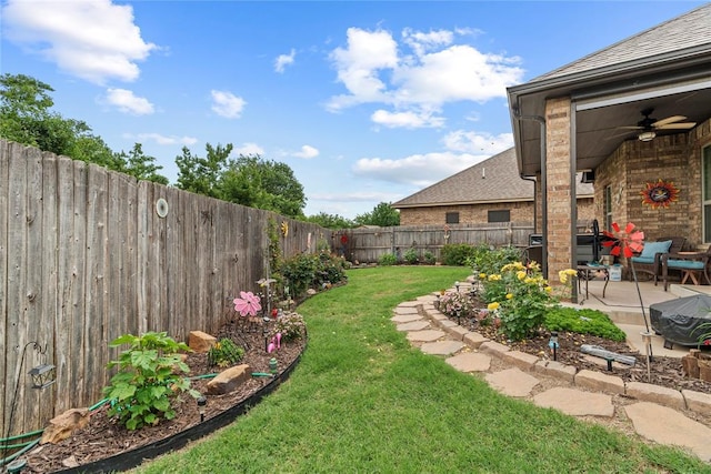 11609 SW 14th St, Yukon, OK 73099 - view of yard with a patio area and ceiling fan