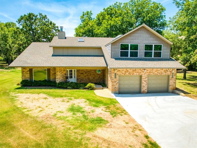 44303 Hardesty Rd, Shawnee, OK 74801 - view of front of property with a front yard, driveway, and a shingled roof
