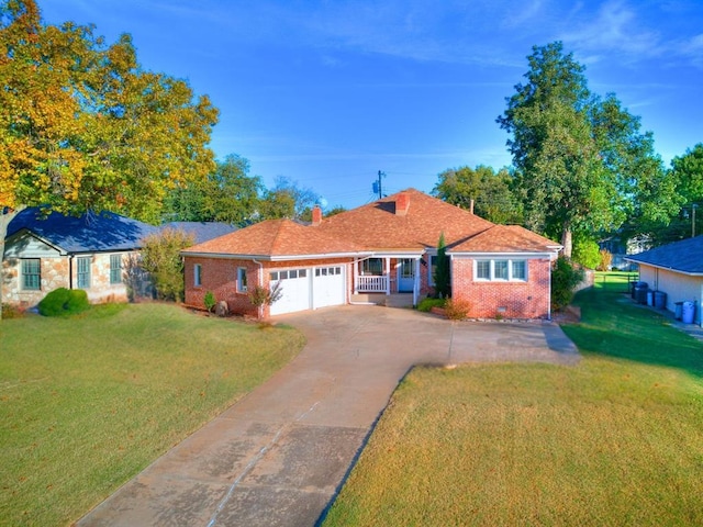 1821 Coventry Ln, Nichols Hills, OK 73120 - view of front of home with an attached garage, a front lawn, and brick siding