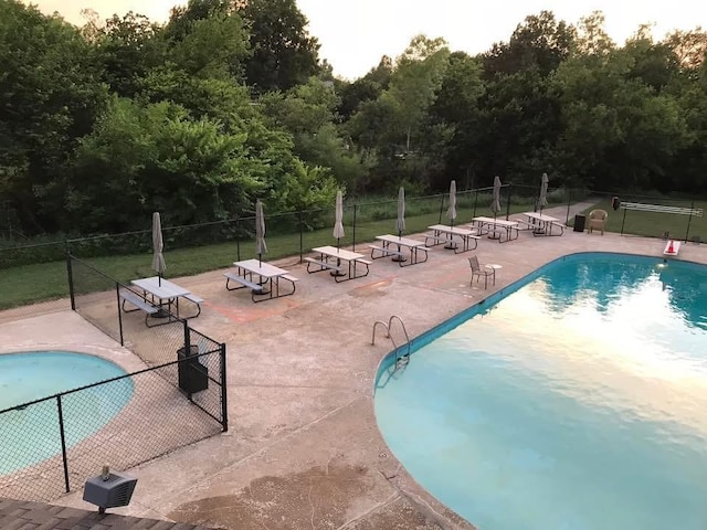 11230 Folkstone Dr, Yukon, OK 73099 - community pool featuring fence and a patio