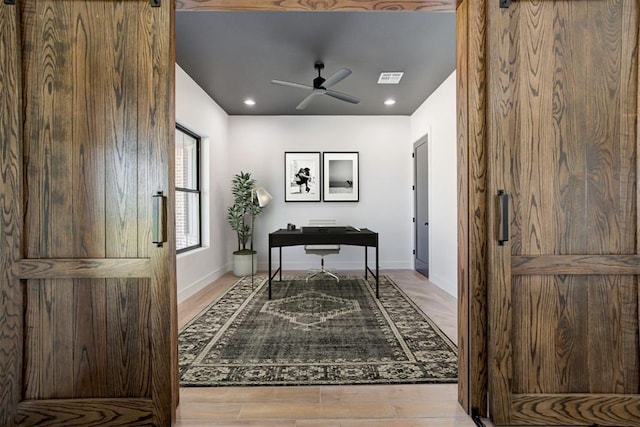 2223 Wintercreek Blvd, Blanchard, OK 73010 - office area with wood finished floors, ceiling fan, and recessed lighting