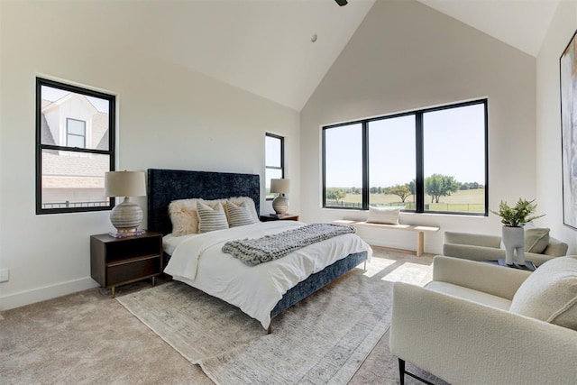 2223 Wintercreek Blvd, Blanchard, OK 73010 - bedroom with high vaulted ceiling and light carpet