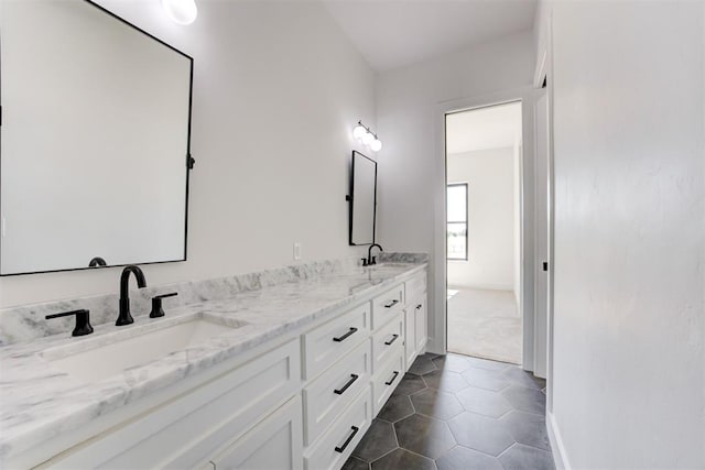 2223 Wintercreek Blvd, Blanchard, OK 73010 - full bathroom with double vanity and tile patterned flooring