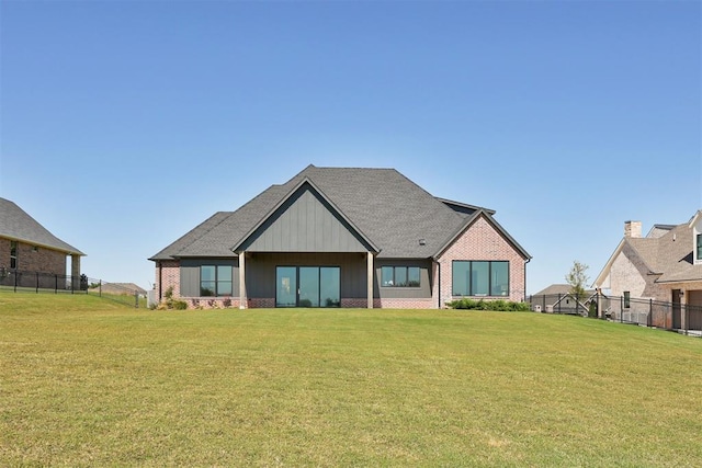2223 Wintercreek Blvd, Blanchard, OK 73010 - back of property featuring a shingled roof