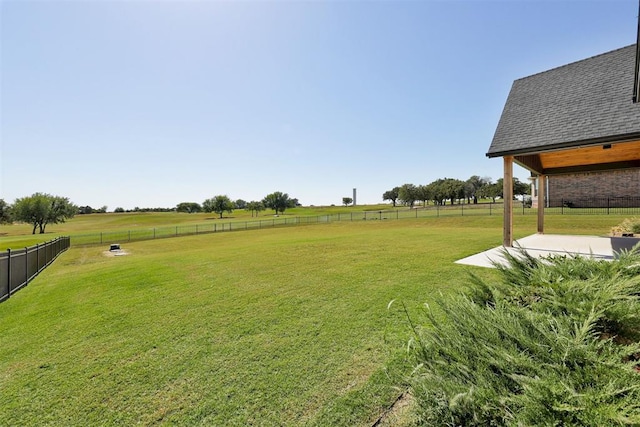 2223 Wintercreek Blvd, Blanchard, OK 73010 - fenced backyard with a patio area and a rural view