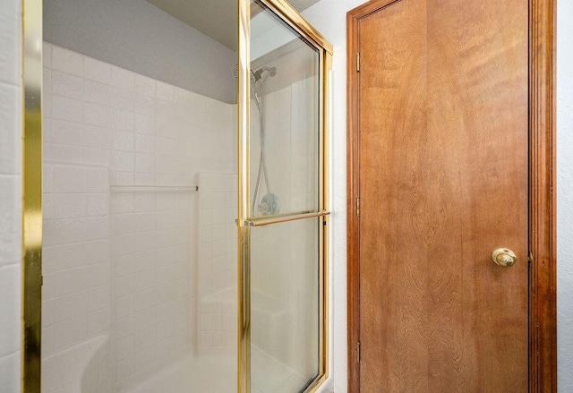 full bathroom with a shower with shower door