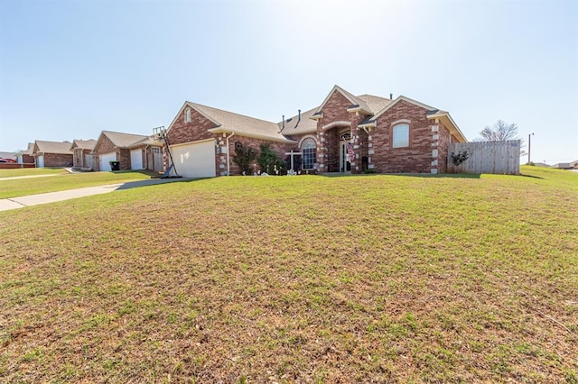 720 Northern Winds Dr, Purcell, OK 73080 - traditional home featuring brick siding, an attached garage, and concrete driveway