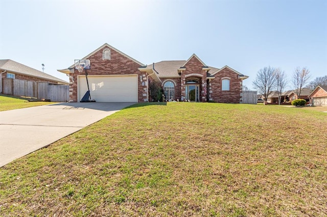 720 Northern Winds Dr, Purcell, OK 73080 - traditional-style home with an attached garage, concrete driveway, and brick siding