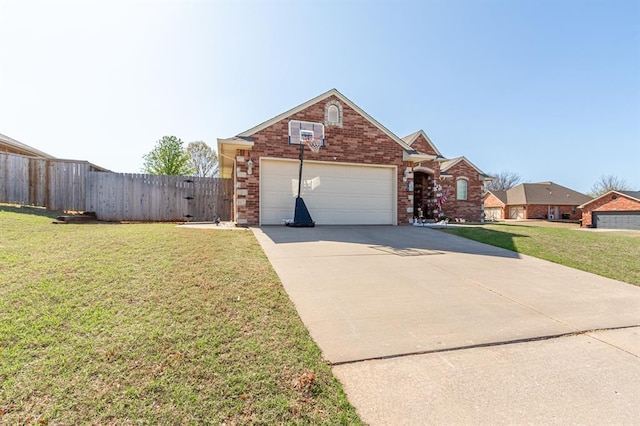 720 Northern Winds Dr, Purcell, OK 73080 - traditional home featuring an attached garage, driveway, brick siding, and a gate