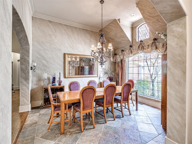 dining room with arched walkways, stone tile flooring, and crown molding