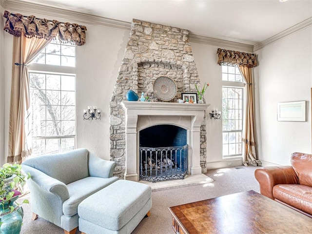 carpeted living area with a fireplace with raised hearth and crown molding