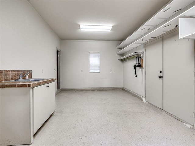 garage featuring a sink