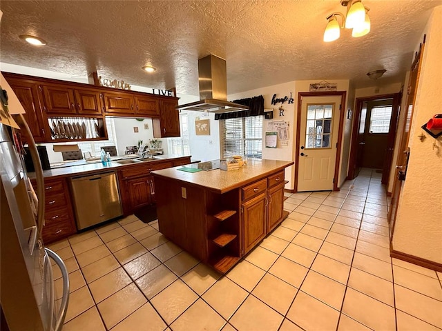kitchen featuring island exhaust hood, stainless steel appliances, open shelves, a center island, and light tile patterned floors