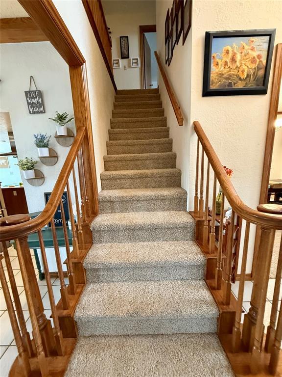 stairs with a textured wall