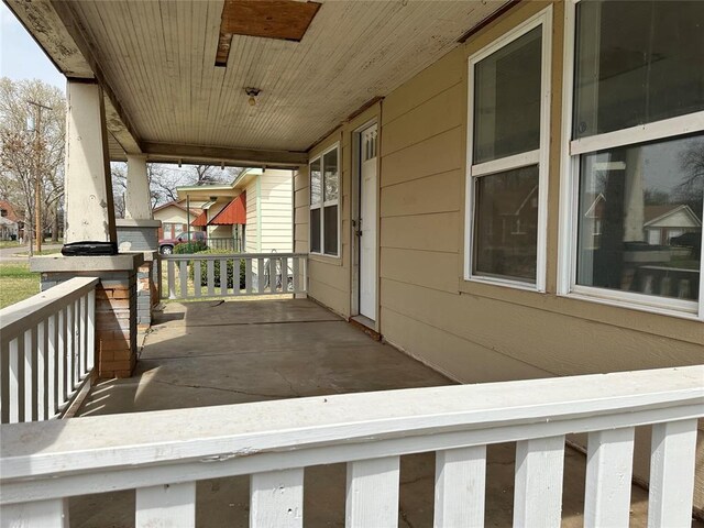 314 N Maryland Ave, Mangum, OK 73554 - deck featuring a porch